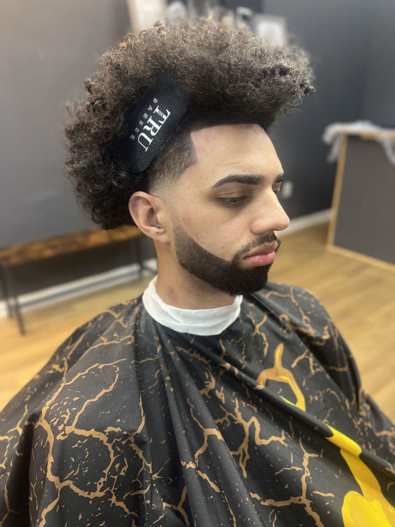 High top with a shaped beard and clean line up